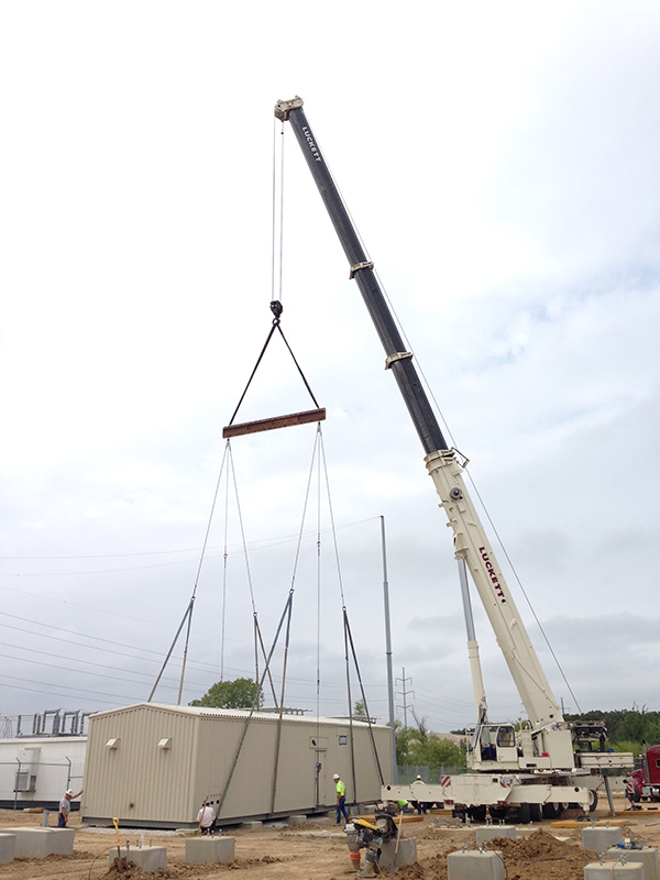 Grove 6350 crane setting switchgear building at substation in Denton, Tx