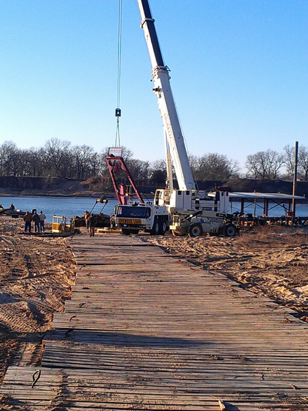 Grove GMK 6350 350 ton all terrain crane lifting sand dredge from Red River